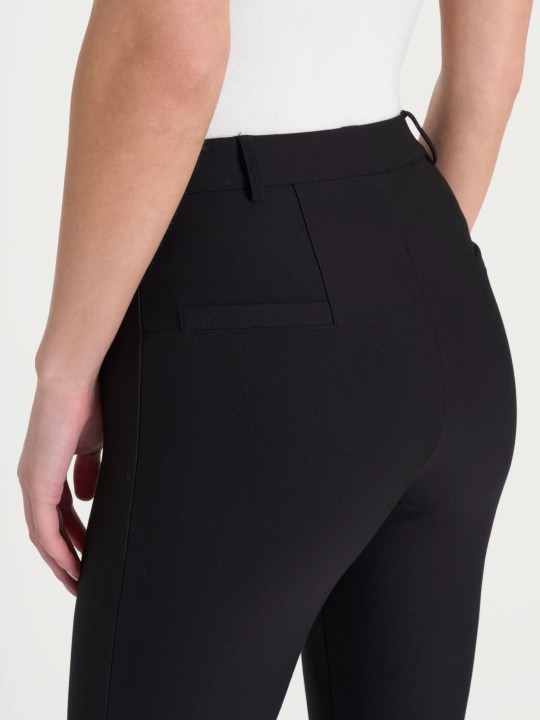 Pantalone flare alla caviglia in Compact DE72PM